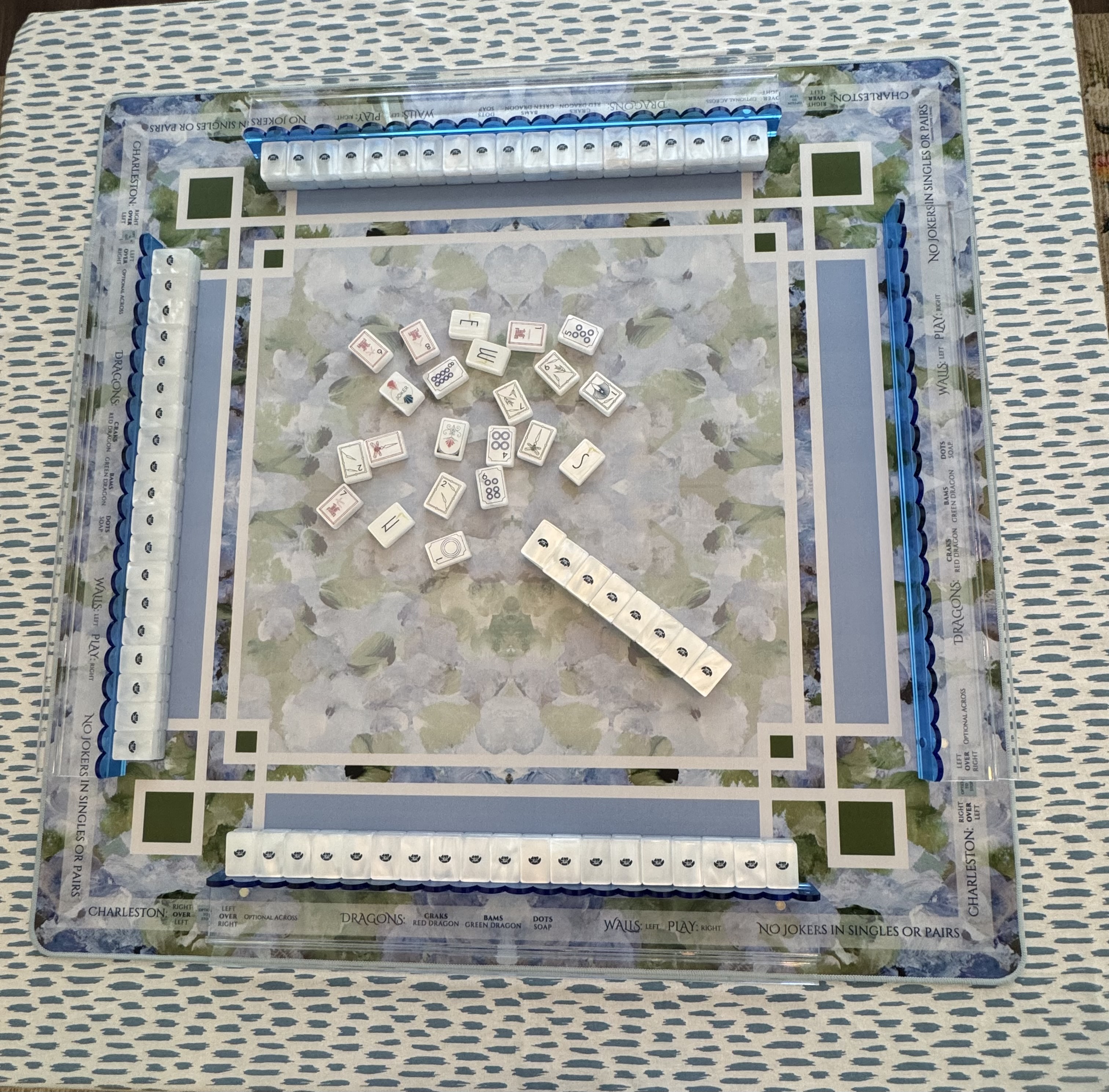 White Mother of Pearl Deco tiles, Hydrangea Bliss mat and acrylic racks with blue pushers